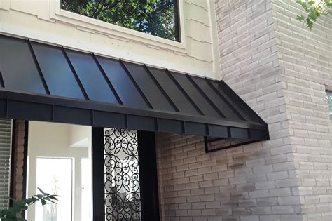 metal roof awning on brick house|pictures of brick house roofs.